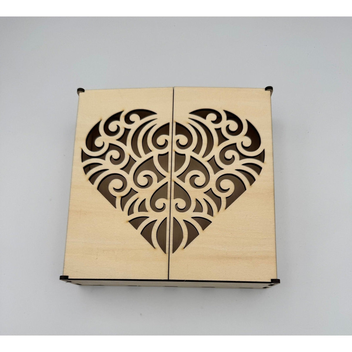 Wooden Box with an Intricate Heart Design